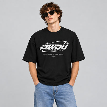 Model wearing the black Away From Home oversized T-shirt