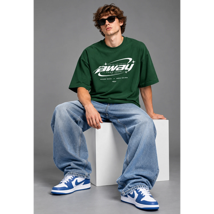 Model wearing the bottle green Away From Home oversized T-shirt
