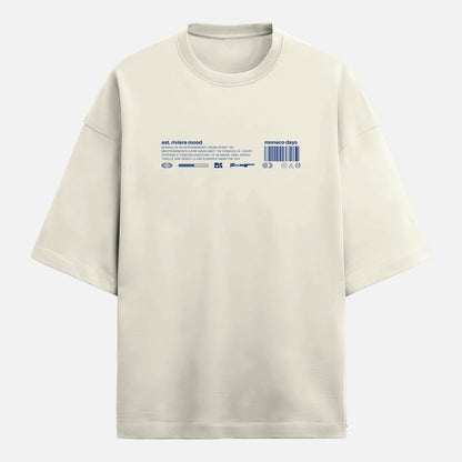 Beige t-shirt with text and graphics on a light gray background