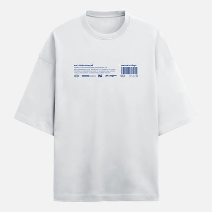 White t-shirt with blue text and graphics on a light gray background