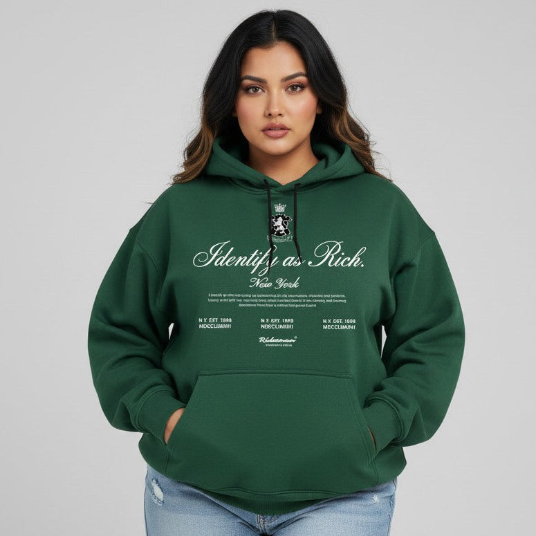 Person wearing a green hoodie with text on a gray background