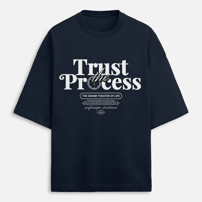 Black t-shirt with 'Trust the Process' text on a light gray background