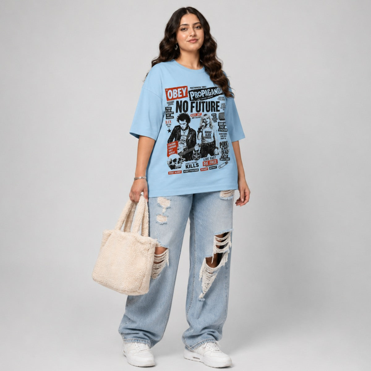 Woman wearing a blue t-shirt with graphic design and text