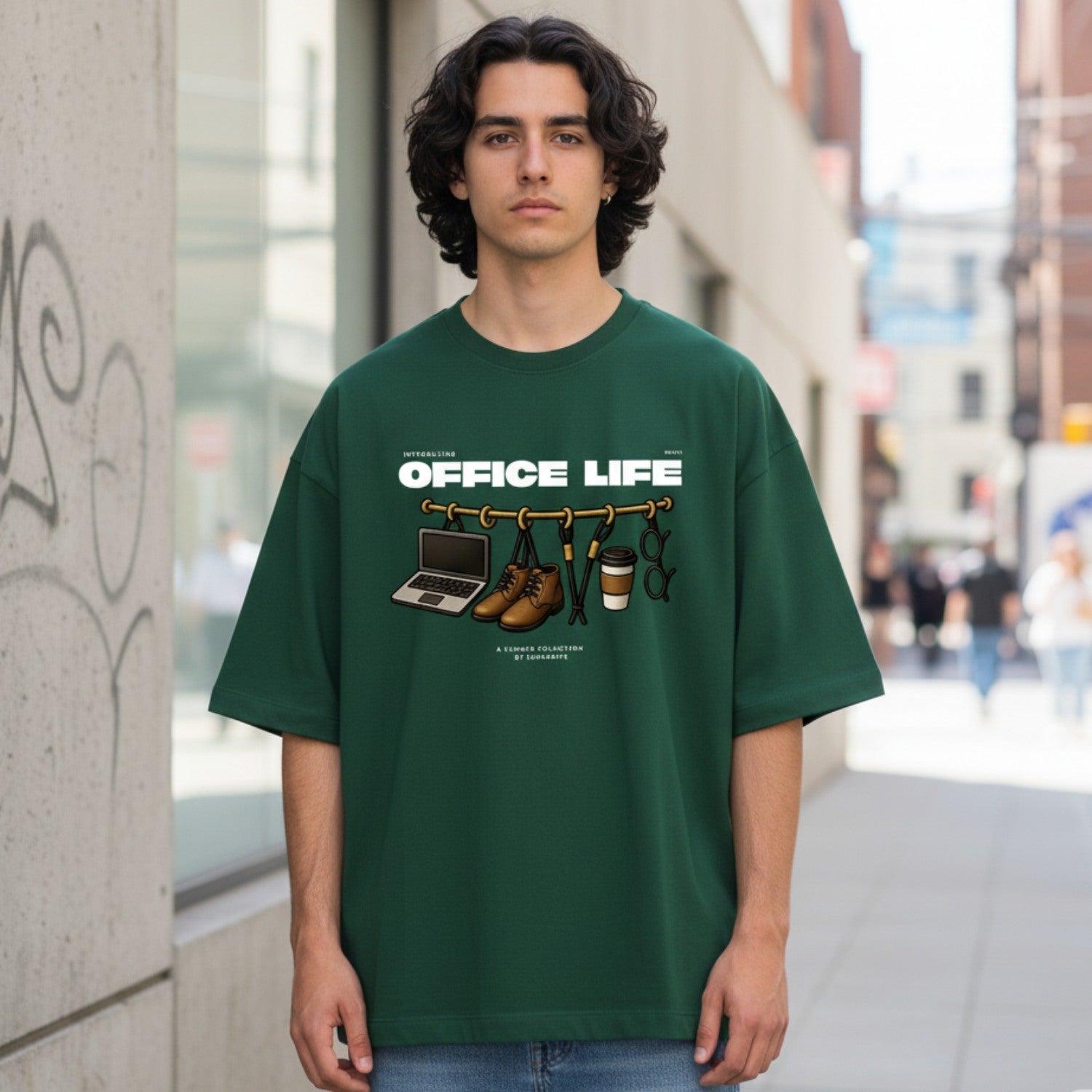 Person wearing a green t-shirt with 'Office Life' graphic design on a city street.
