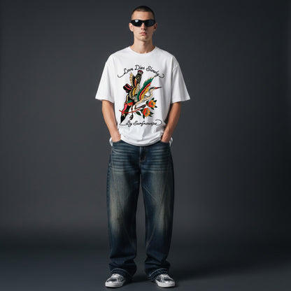 Person wearing a white t-shirt with a colorful graphic design on a dark gray background
