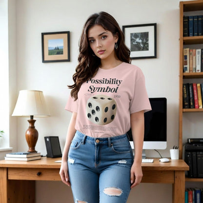 Woman wearing a pink t-shirt with a graphic design in a home office setting