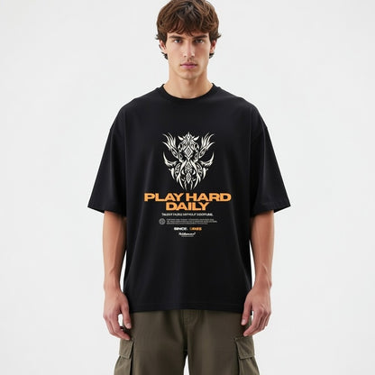 Person wearing a black t-shirt with a graphic design and text on a white background