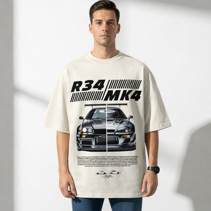 Man wearing a t-shirt with a car design and text on a white background