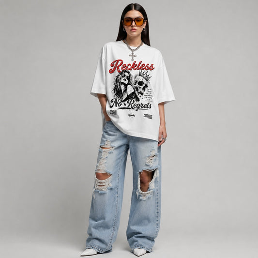 woman-wearing White t-shirt with graphic design featuring a woman, skull, and text on a white background