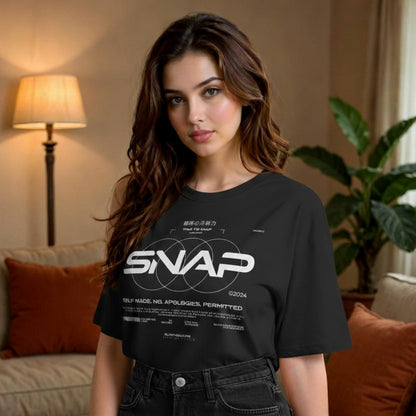 Woman wearing a black t-shirt with 'SIVAP' logo in a living room setting
