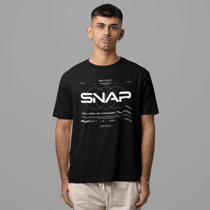 Person wearing a black t-shirt with 'SNAP' logo on a gray background
