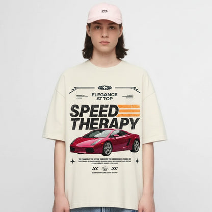 Person wearing a cream t-shirt with a car graphic and text on a white background