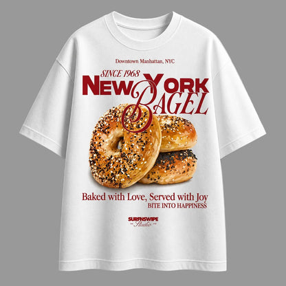 White t-shirt with New York Bagel advertisement on a gray background