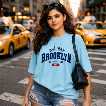 woman-wearing-blue-Brooklyn-graphic-t-shirt