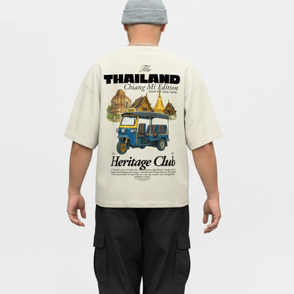 Person wearing a cream t-shirt with 'Thailand Chiang Mai Edition' design on a white background