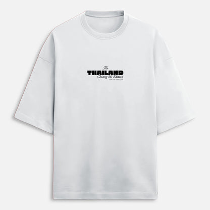 White t-shirt with black text on a white background