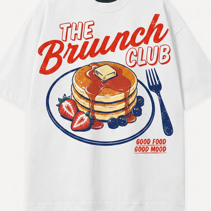 White sweatshirt with 'The Brunch Club' design featuring pancakes, berries, and a fork.