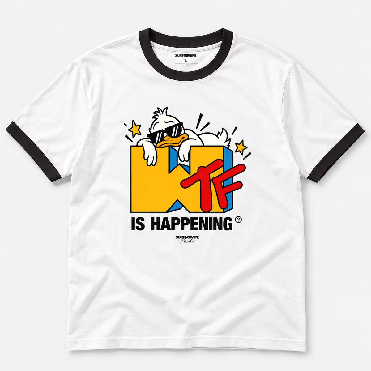 A white ringer t-shirt with black trim on the collar and sleeves, featuring a colorful graphic of a cartoon duck wearing sunglasses over a yellow and blue block with red 'TF' text and the words 'IS HAPPENING'.